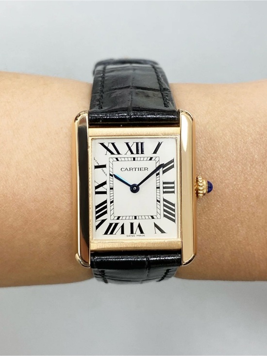 Cartier Other - Cartier Tank Watch in Black and Gold with Blue Cabochon
